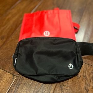 Brand new Lululemon Everywhere Belt Bag and reusable Lululemon shopping bag
